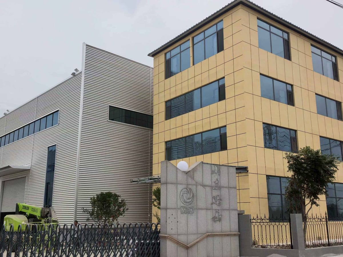 Actual project: workshop facade with 4-storey office block